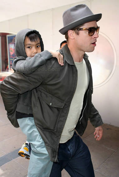 Brad Pitt y su hijo Maddox 4